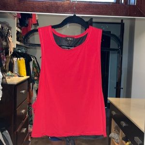 Alala red tank with black mesh back, no flaws, medium